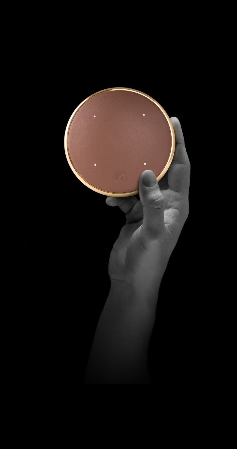 A stylish bedroom with a generous bed and a functional desk, blending comfort and modern design elements seamlessly.